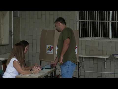 Venezuelans cast their vote in Caracas amid presidential election