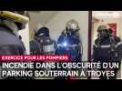 Exercice incendie dans l'obscurité d'un parking souterrain troyen pour les pompiers