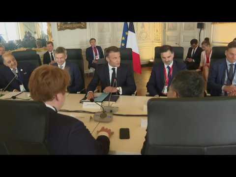 President Macron hosts green industry roundtable at "Choose France" summit
