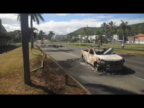 Torched vehicles in Noumea as New Caledonia under state of emergency