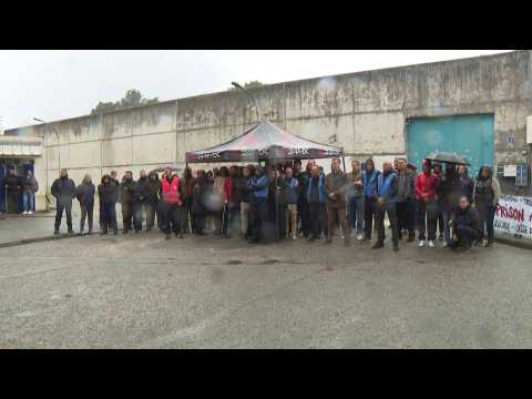 Minute's silence outside prison near Bordeaux after two officers killed