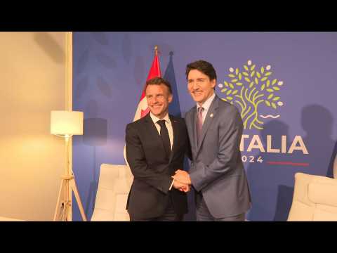 French President Emmanuel Macron meets Canadian PM Justin Trudeau during G7 summit