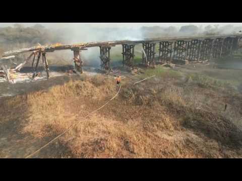 Firefighters attempt to put out fires in Brazil's Pantanal