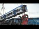 Chile workers remove wagon after deadly train crash