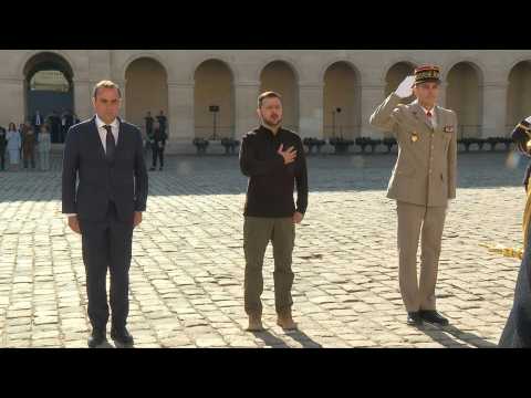 Zelensky welcomed with military honours at Les Invalides in Paris