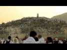 Pilgrims ascend Mount Arafat for hajj climax