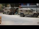 Israeli military vehicles during raid on West Bank camp