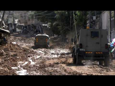 Israeli army vehicles manoeuver in streets of Tulkarem during raid