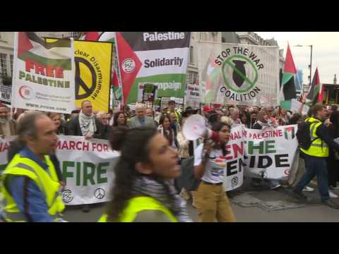 Pro-Palestinian demonsrators march in London