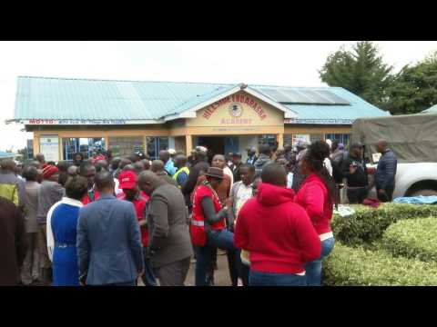 Parents gather outside Kenya primary school after fire kills 17 children