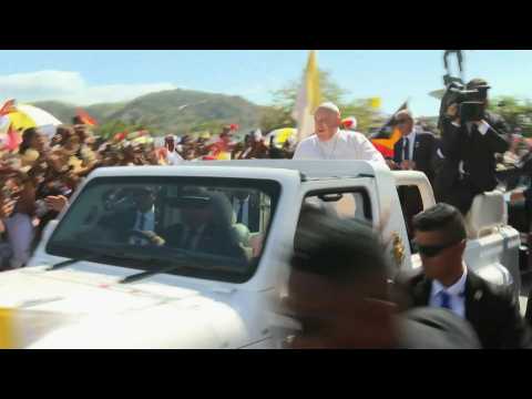 Pope lands in East Timor to rock star welcome