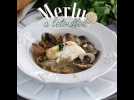 Merlu à l'étouffée, palourdes et petits pois