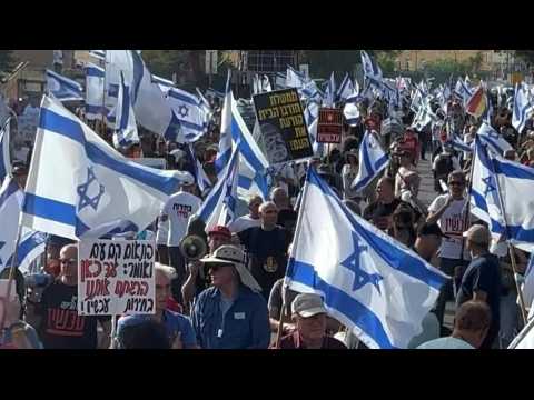 Israeli anti-government protesters rally outside Knesset