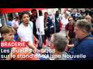 Braderie de Saint-Quentin : les joueurs du SQBB sur le stand de L'Aisne Nouvelle