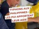 Secours - Les Pompiers de l'urgence internationale distribuent l'aide alimentaire aux sinistrés de l'île de Leyte aux Philippines