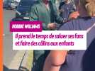 Robbie Williams prend le temps de bien saluer ses fans allemands à sa descente d'avion. Grand artiste.