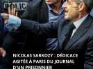 Supporters et détracteurs de Nicolas Sarkozy : dédicace agitée à Paris du Journal d'un prisonnier